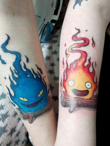 Unterarm-Tattoo, Schwestern-Tattoo, Partner-Tattoo in Farbe, Calcifer der Feuerdämon aus dem Studio-Ghibli-Film Das wandelnde Schloss.